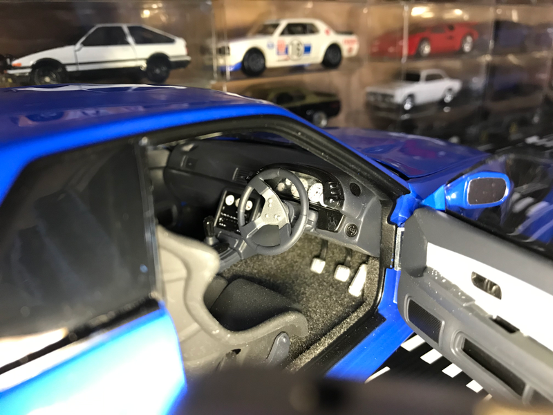 Note the gauges. If you look closely, there are proper dials and needles. Note also the carpet.